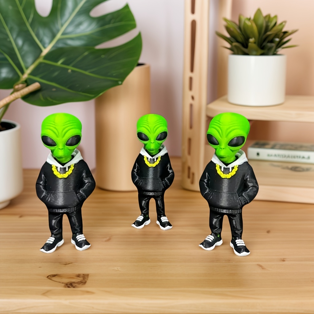 1 stuk groene alienfiguur met  - Desk Setup Design recensie en prijs
