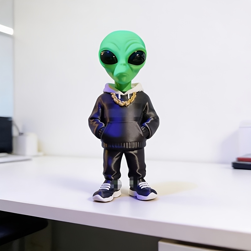1 stuk groene alienfiguur met  - Desk Setup Design recensie en prijs